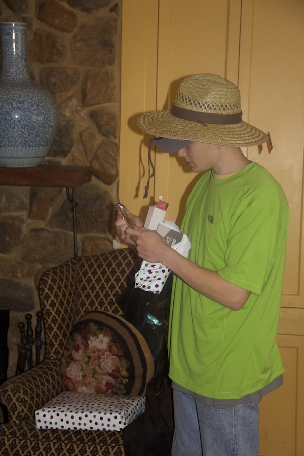 Hunter added yet another shirt and if you look closely a hat is under the farm hat.