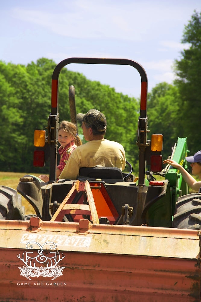 . I can barely get my baby (she is really growing up) off the tractor with her daddy, but I know her daddy LOVES IT!! Just look at them.