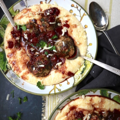 Meatballs with Wine Sauce over Polenta is one fantastic comfort food! They are amazing and simple to make!! gameandgarden.com
