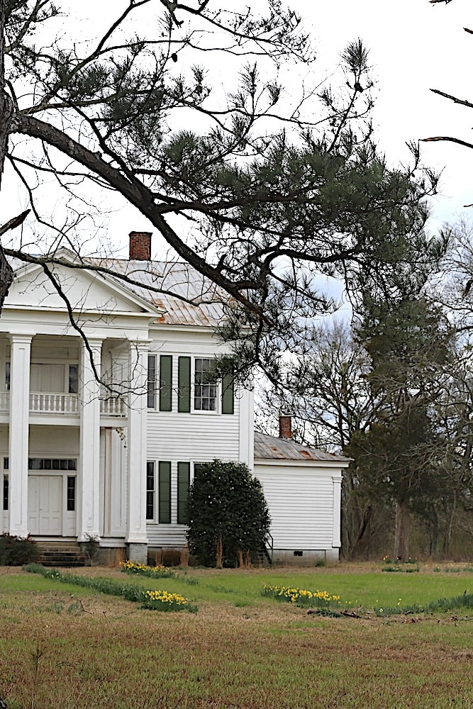 Stately older home, two story white house with columns