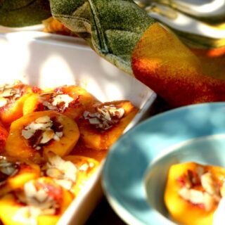 Baked Peaches with Honey and Almonds are spectacular for entertaining or dinner with your family.