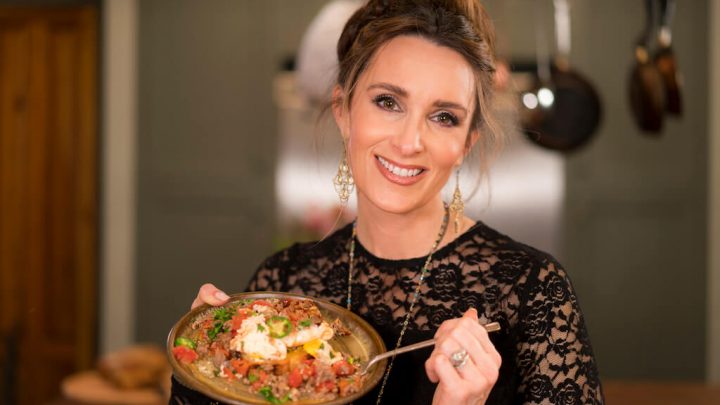 Stacy holding breakfast skillet dish