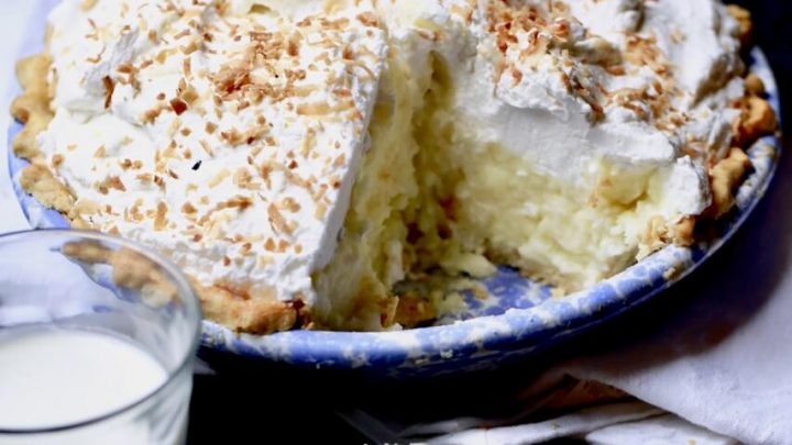 Coconut pie topped with whipped cream