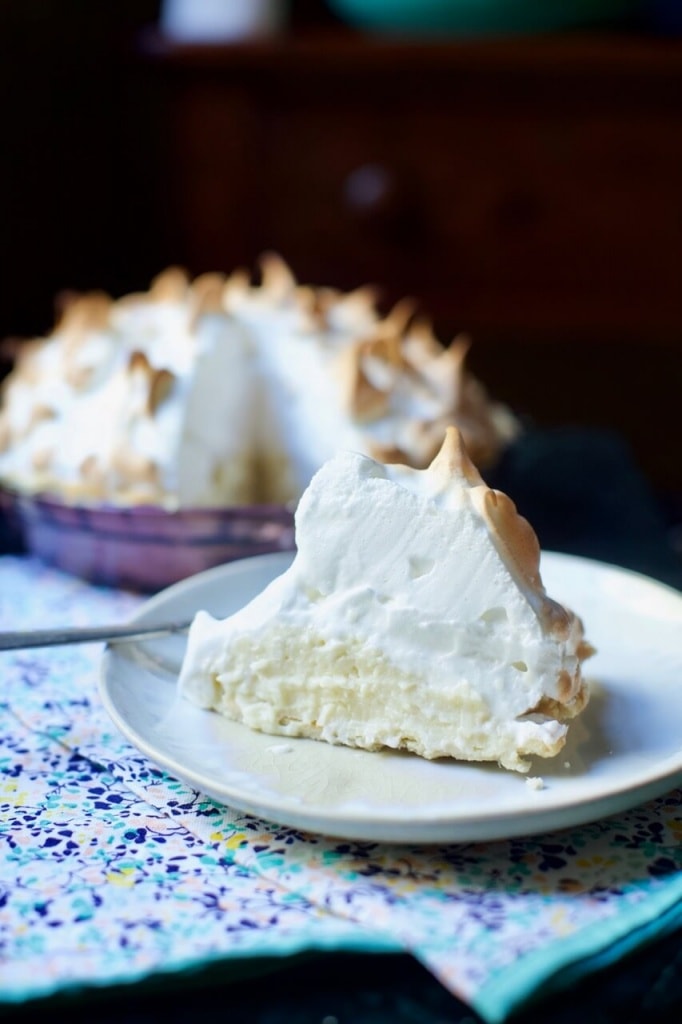 Coconut cream pie topped with whipped cream