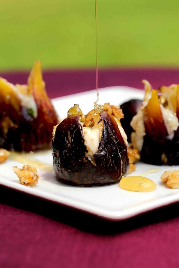 Stuffed figs baked with honey mascarpone cheese filling drizzled with honey