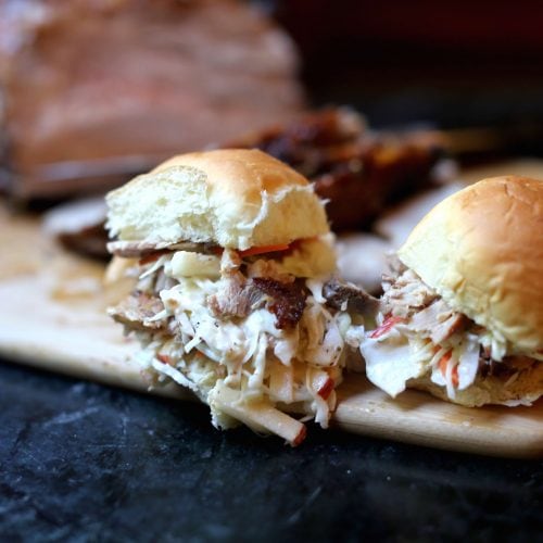 Smoky roasted pulled pork sliders with coleslaw made with mustard and apples