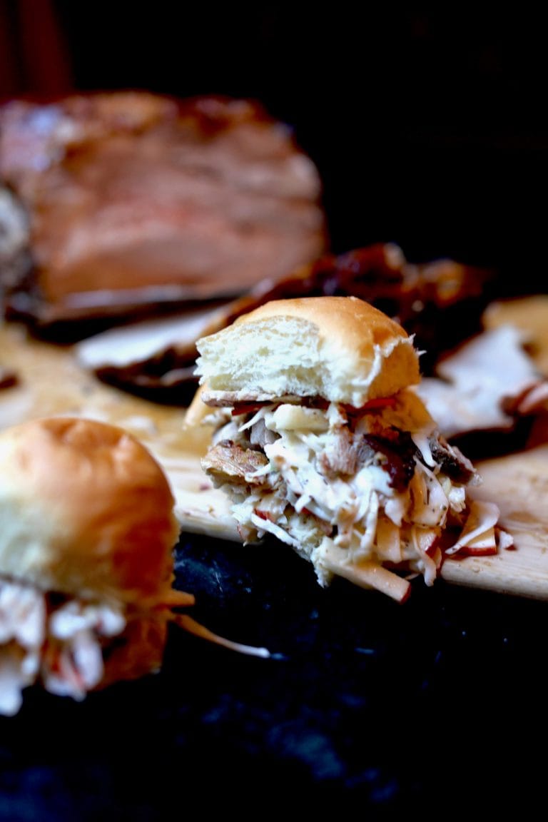 Smoky roasted pulled pork sliders with coleslaw made with mustard and apples