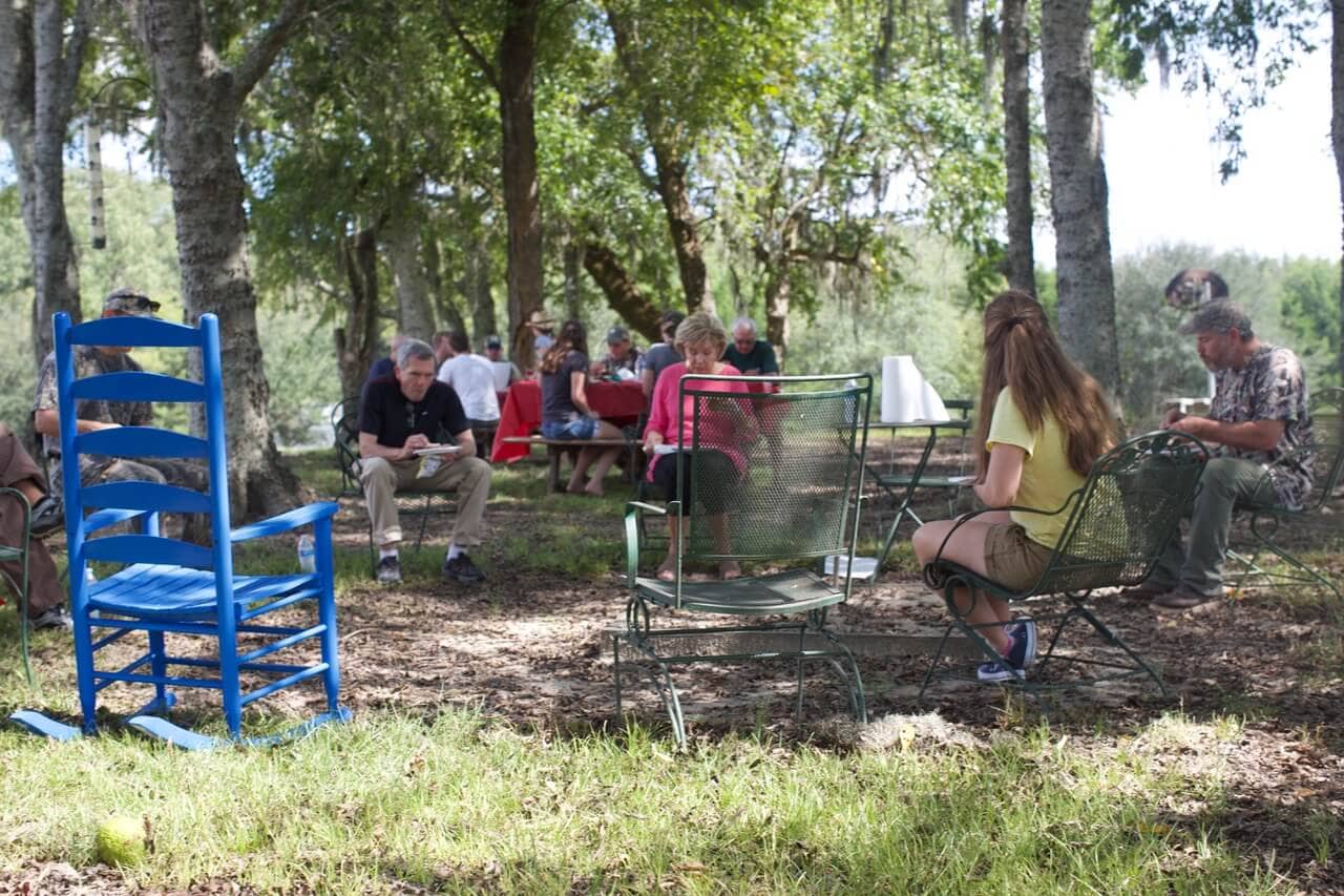 Various participants and spectators of the dove hunt eating together