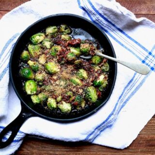 Oven roasted brussels sprouts with beer-glazed bacon topping, recipe by stacy lyn harris