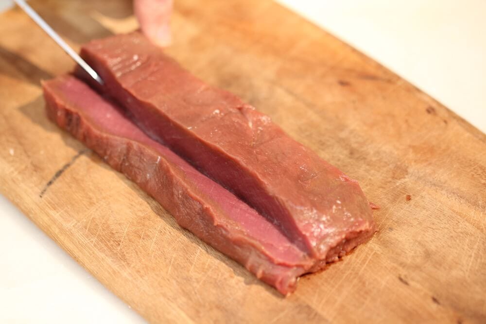 the butterfly technique to stuff venison loin, photo by Stacy Lyn Harris