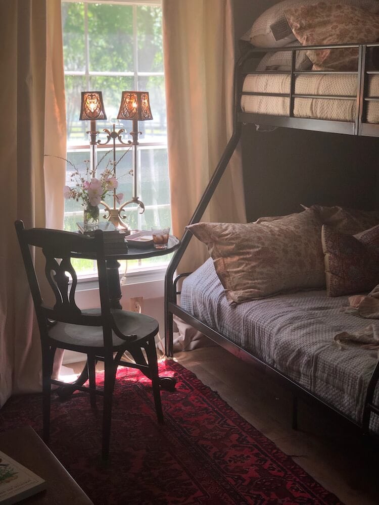 A picture of home decor and artwork in Stacy Lyn Harris's restful bedroom, from her blog on How to Create a Restful Bedroom