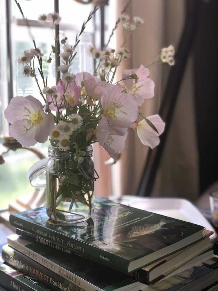 A picture of home decor and artwork in Stacy Lyn Harris's restful bedroom, from her blog on How to Create a Restful Bedroom