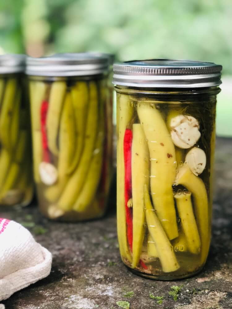 Okra pickling in mason jars, classic pickled okra recipe by stacy lyn harris
