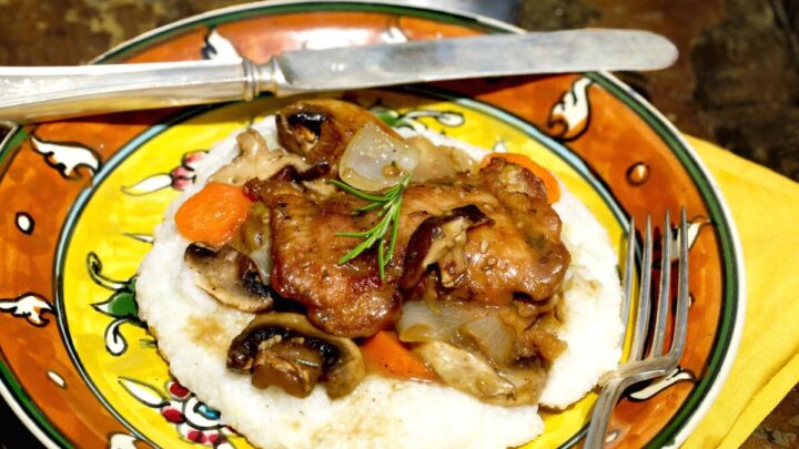 Picture of Chicken and Mushrooms over Cheesy Grits, recipe by Stacy Lyn Harris from her Harvest Cookbook