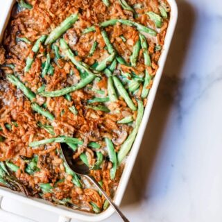 Photo of a pan or tray of green bean casserole, from Stacy Lyn Harris's recipe for "Green Bean Casserole" Christmas 2019
