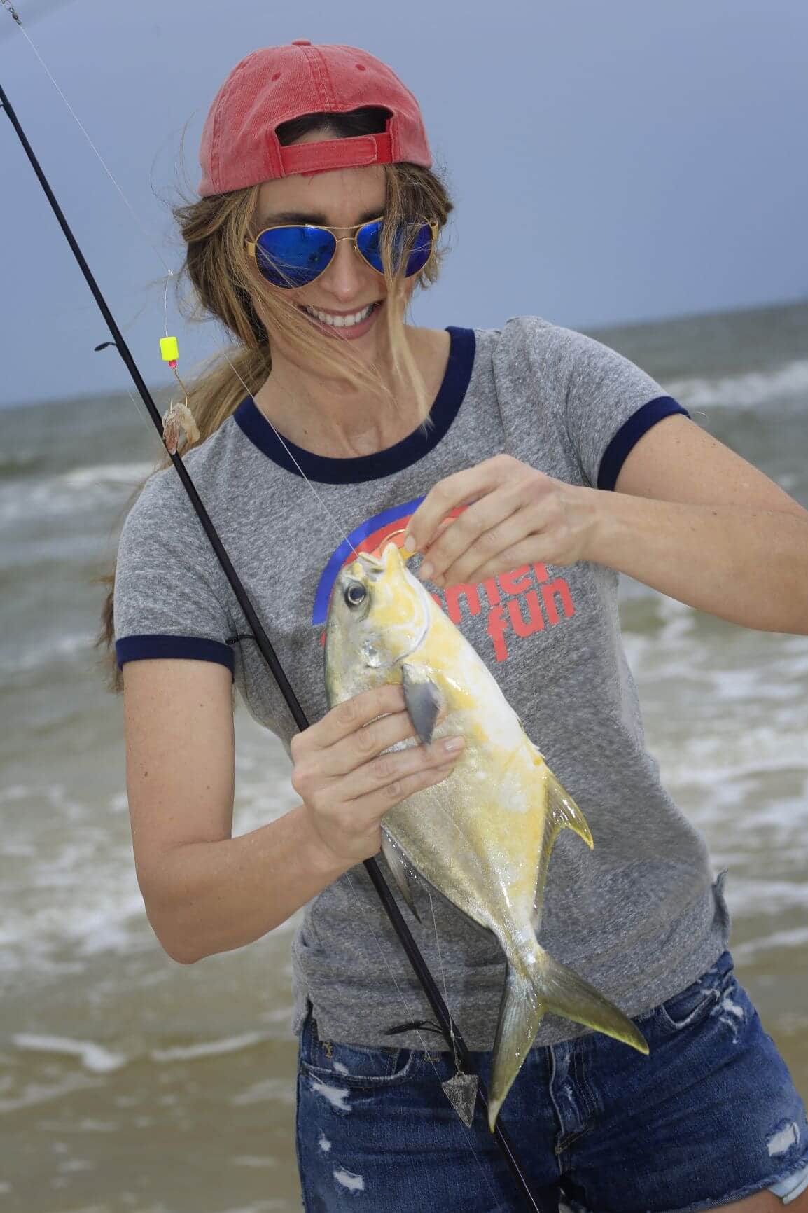 Stacy Lyn Harris fishing at the beacg