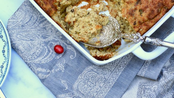 Thanksgiving Dressing in Rectangle Casserole Dish with Plate full of Casserole