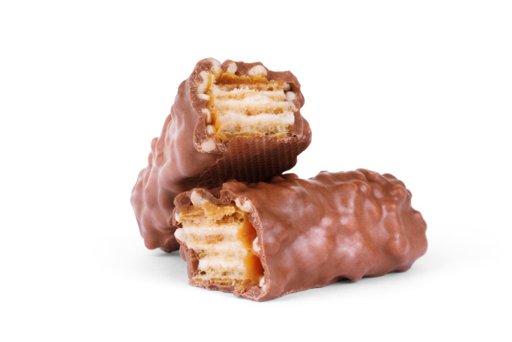 Butterfinger candy bar broken in half for Butterfinger Cheesecake