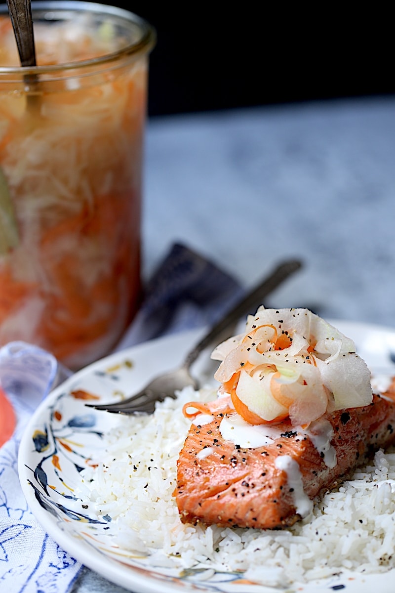 Salmon on A Bed of Rice with Pickled Daikon and Carrots on top