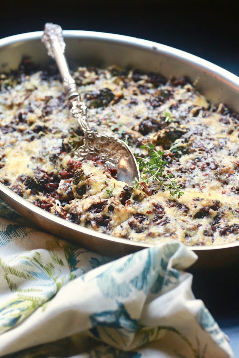 Cheesy wild rice casserole with broccoli and thyme casserole branches on top
