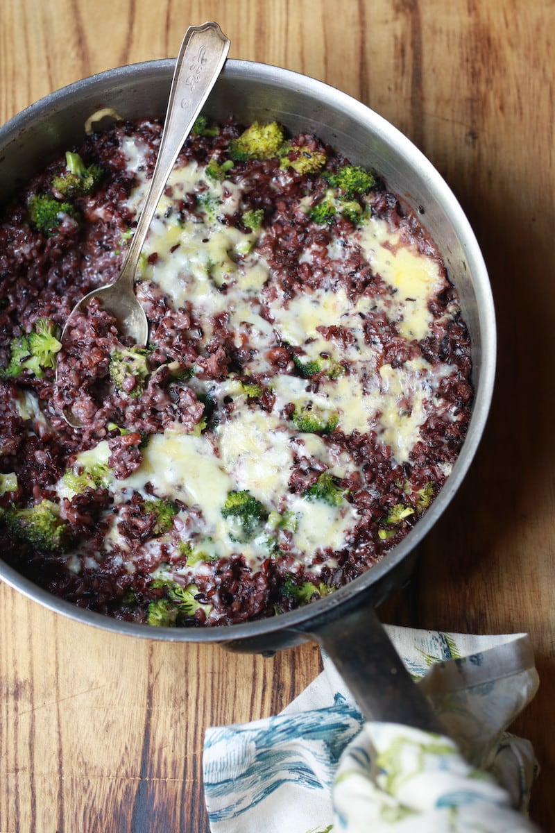 Broccoli Cheese Wild Rice in copper pot with stainless spoon