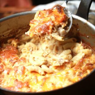 Copper pot of Mac and Cheese with crawdads