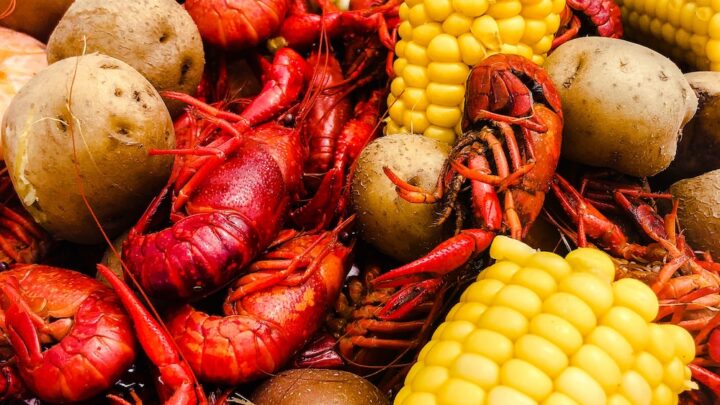 Very close up of crawfish, corn, and potatoes after crawfish boil