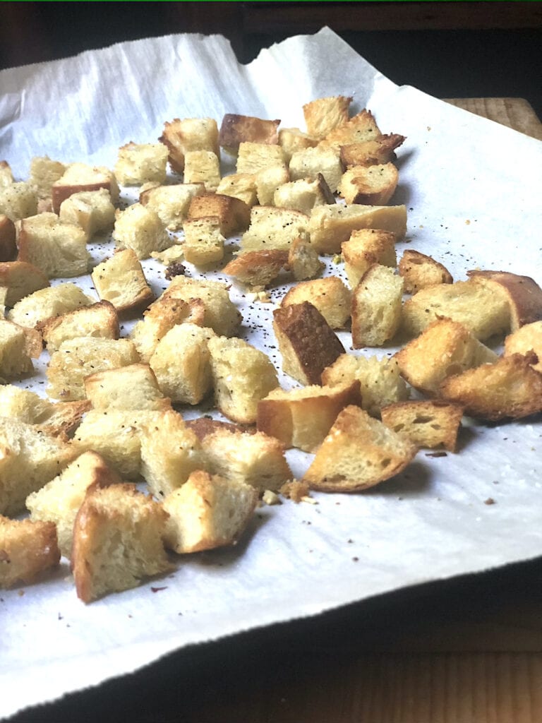 homemade croutons toasted on baking sheet