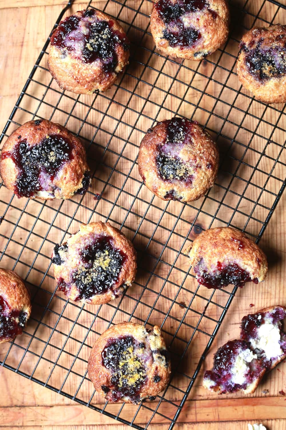 overhead view of berry muffins baked with sugar crumb topping