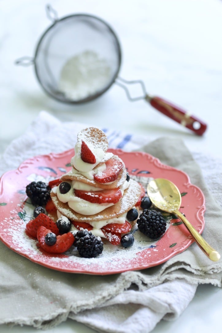 serving of ultimate strawberry shortcake on pink plate