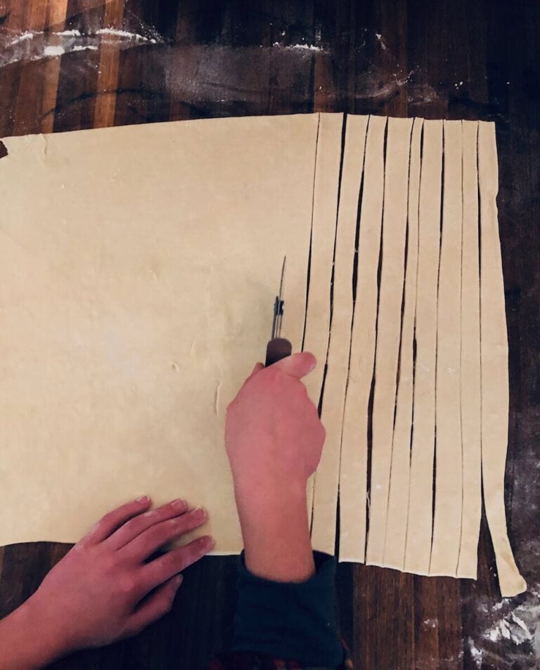 Roll the dough to a 1/8-inch thick square and cut the dough into 1-inch strips.
