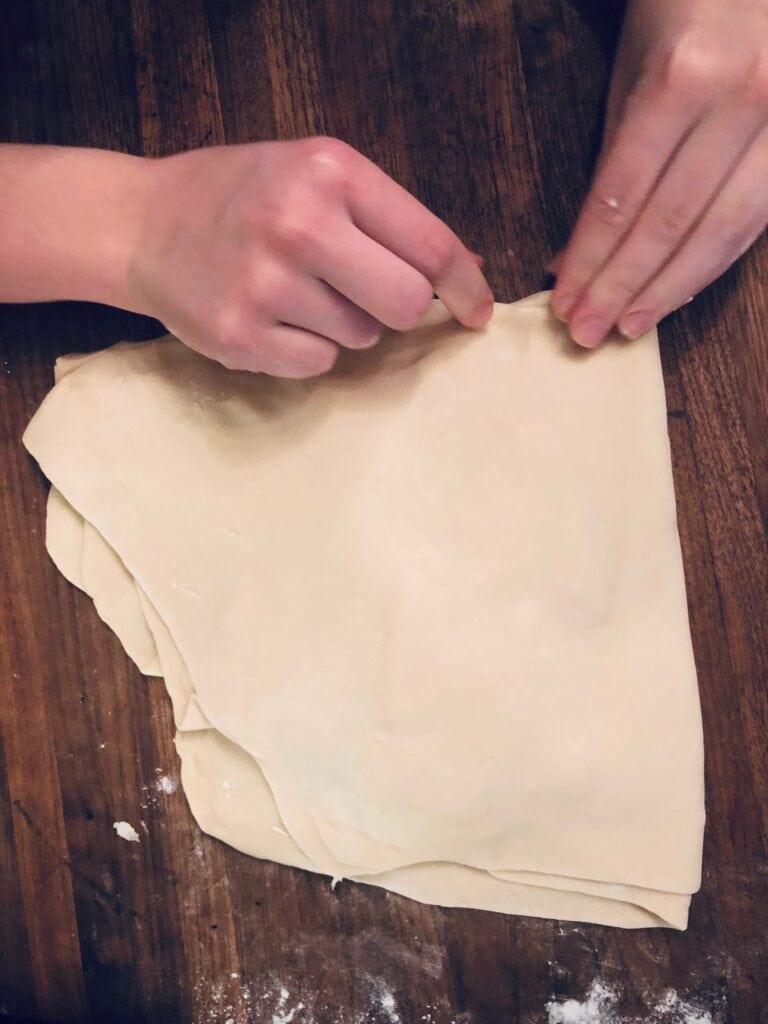 Pinch the edges of the dough so that the butter doesn’t seep out of the sides when rolling the dough.
