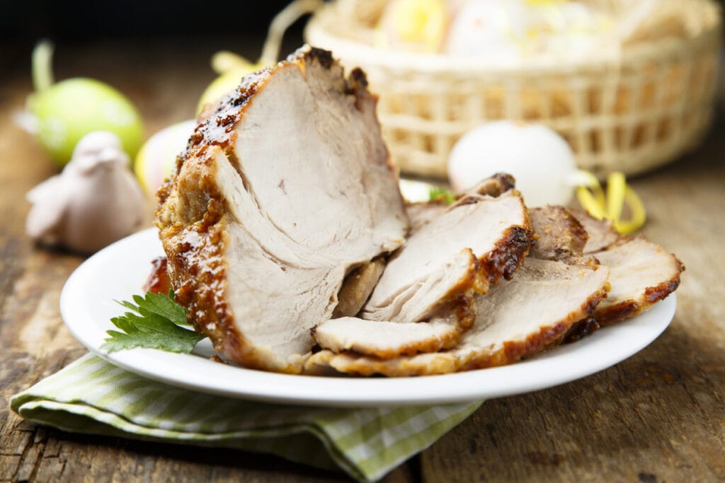 sliced turkey with honey glaze on plate