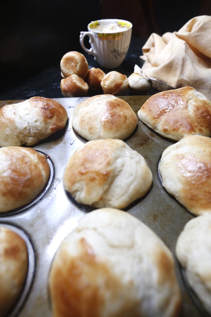 Yeast Rolls in the Muffin pan with smaller muffins behind it