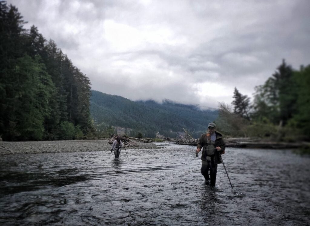 Scott Harris fly fishing in Alaska - forward view in water