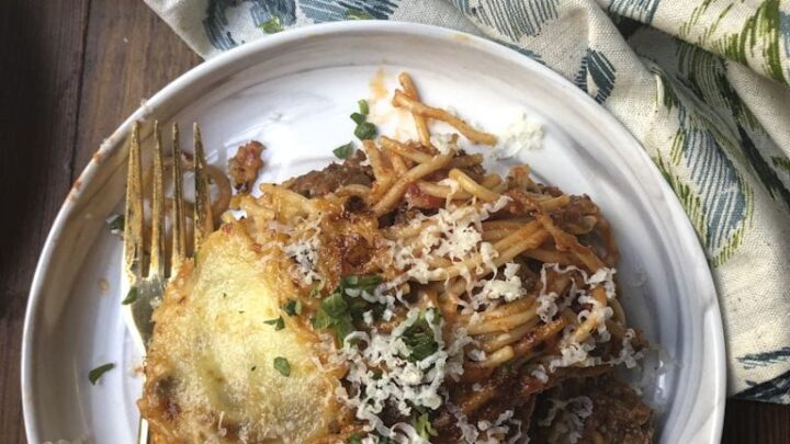 serving of baked cream cheese spaghetti on a plate