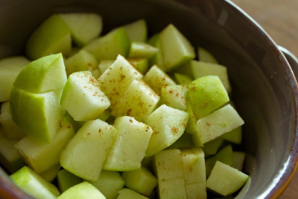 diced green apples in steel bowl