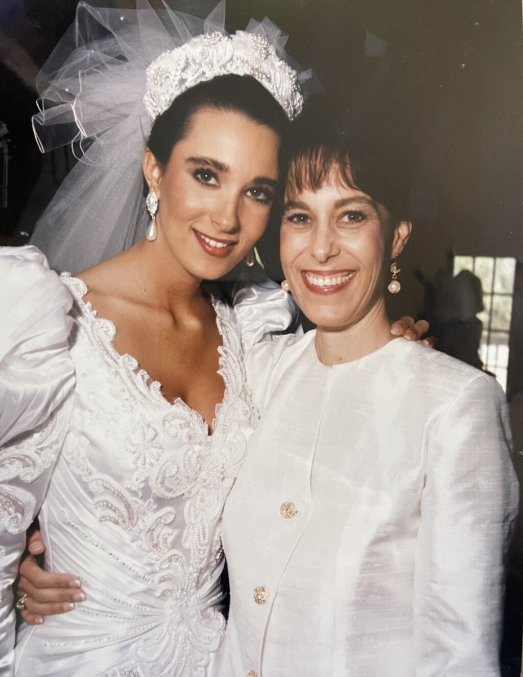 Stacy Lyn in wedding dress with her mom