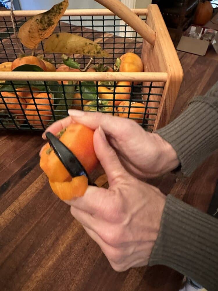 Stacy Lyn slicing persimmons