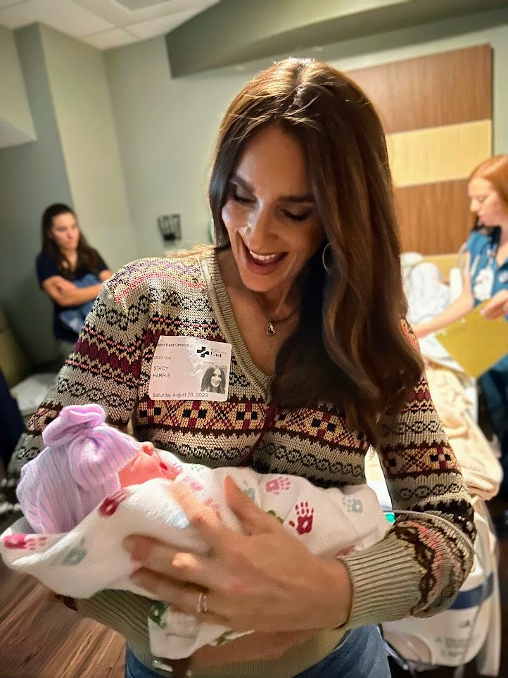 Stacy Lyn holding baby Flora