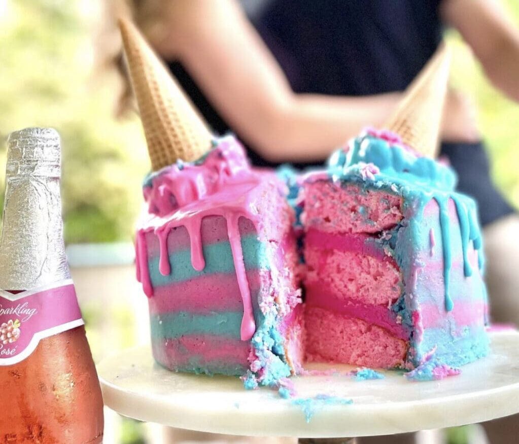 pink and blue cake for baby sex reveal party