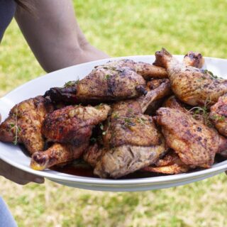 smoked bbq chicken platter carried by Stacy Lyn outdoors