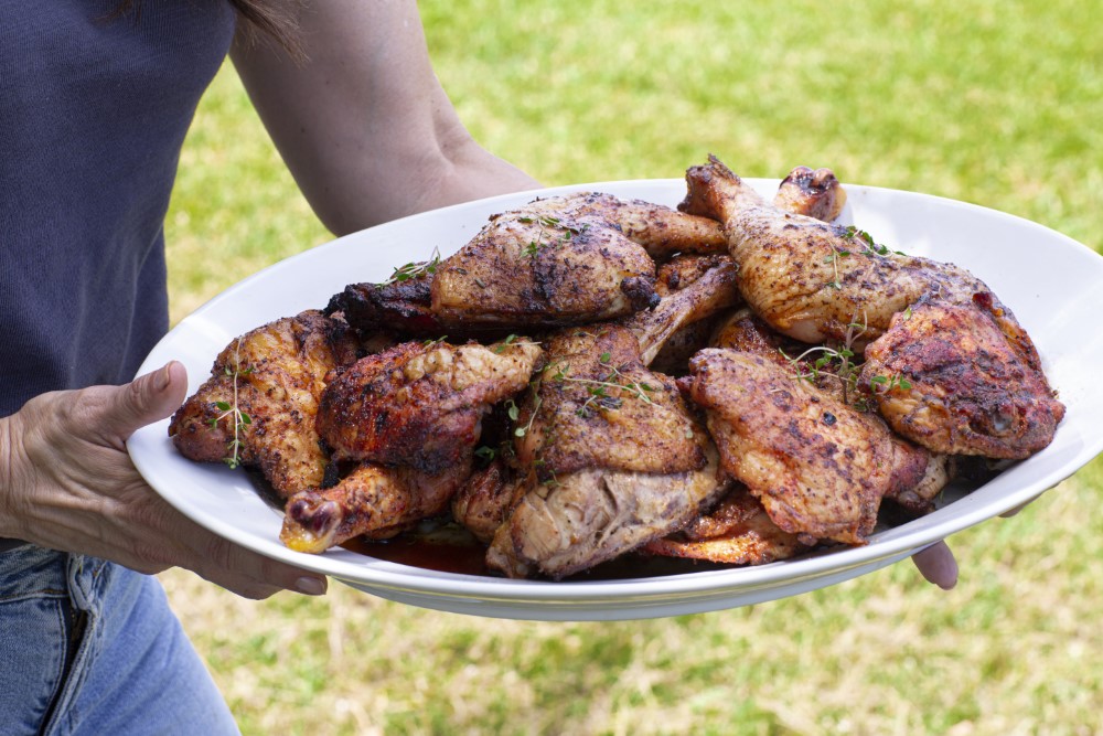 smoked bbq chicken platter carried by Stacy Lyn outdoors