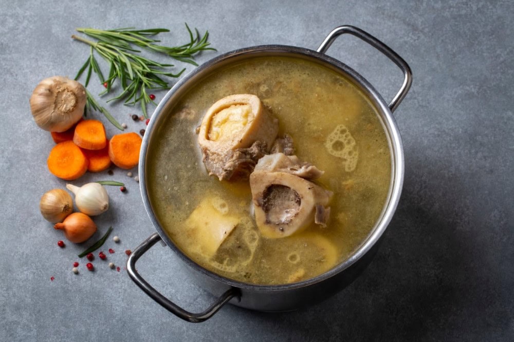 venison bone broth in stock pot