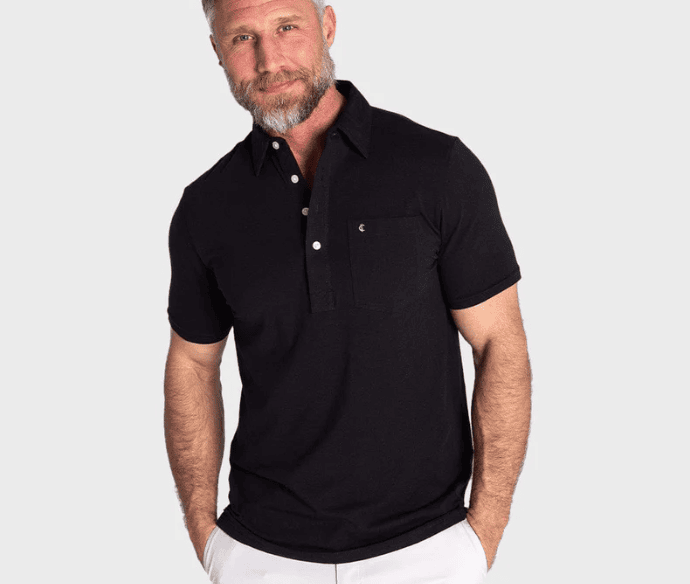 bearded man in black Criquet polo shirt