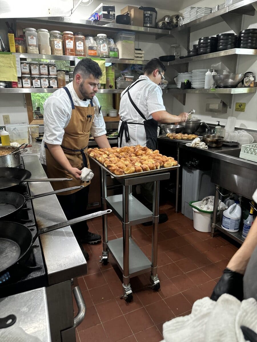 chefs preparing crab beignets at Talon Lodge in Sitka, Alaska