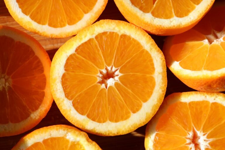 sliced oranges, cut side up and close together